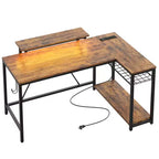 Bureau Gaming de 132 cm avec éclairage LED, Bureau d'angle en forme de L avec prise de courant et support de moniteur, Bureau d'ordinateur d'angle